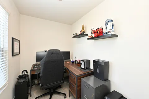 a view of workspace with wooden wall