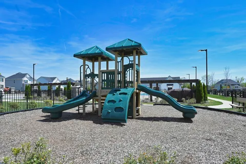 a view of a park with a slide