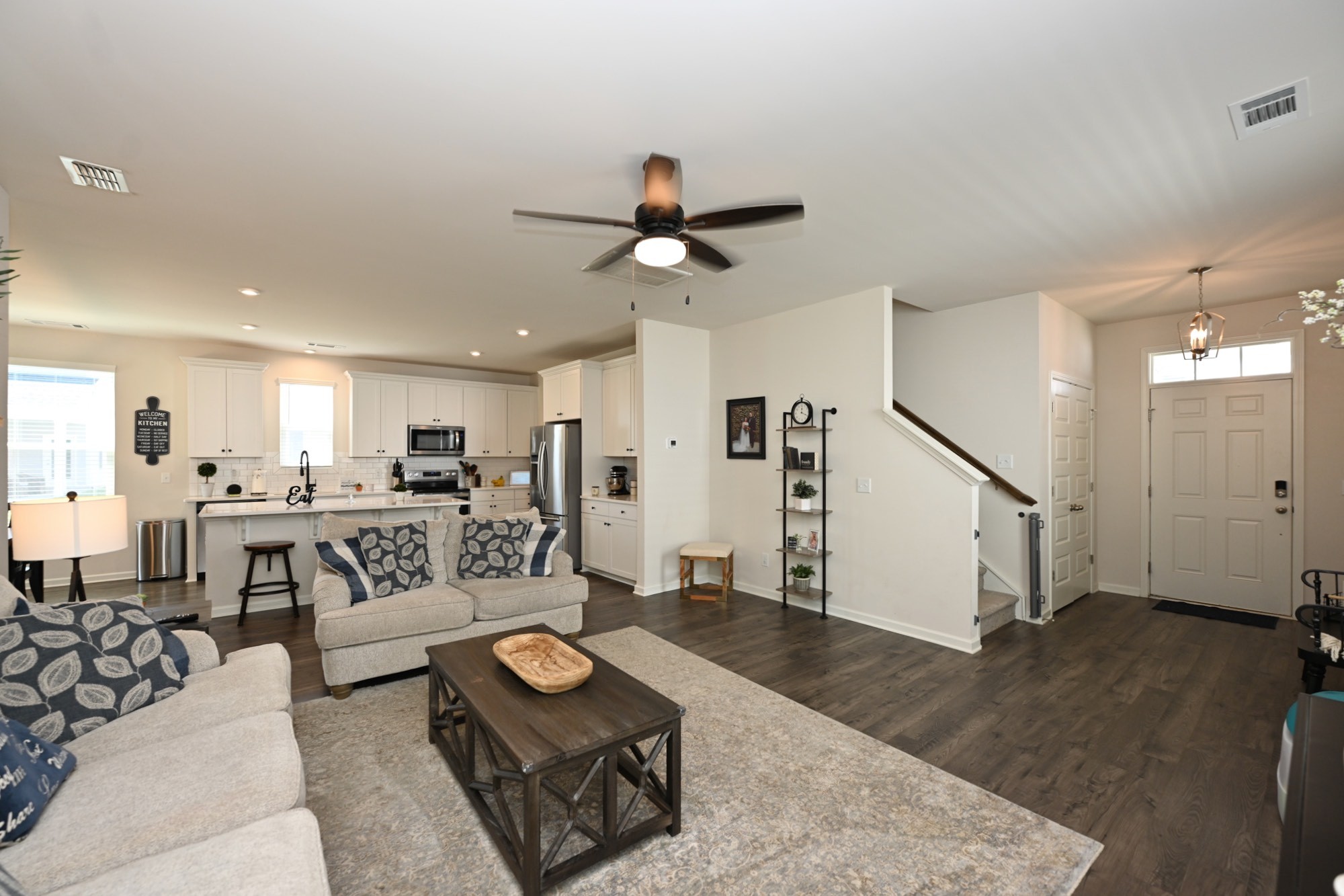 522 Red Barn Way Mount Juliet, TN 37122 - Photo 5 of 25 a living room with furniture and a chandelier