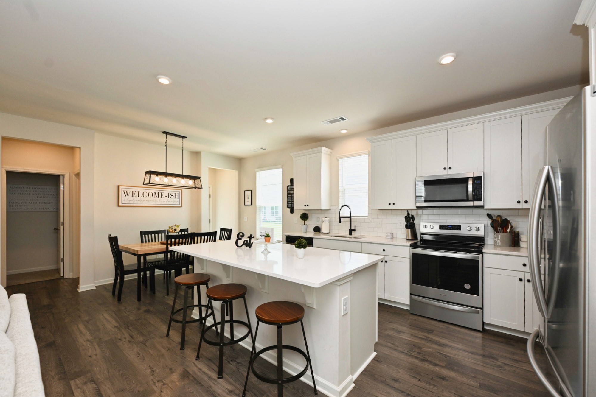 522 Red Barn Way Mount Juliet, TN 37122 - Photo 6 of 25 a kitchen with appliances a sink and chairs
