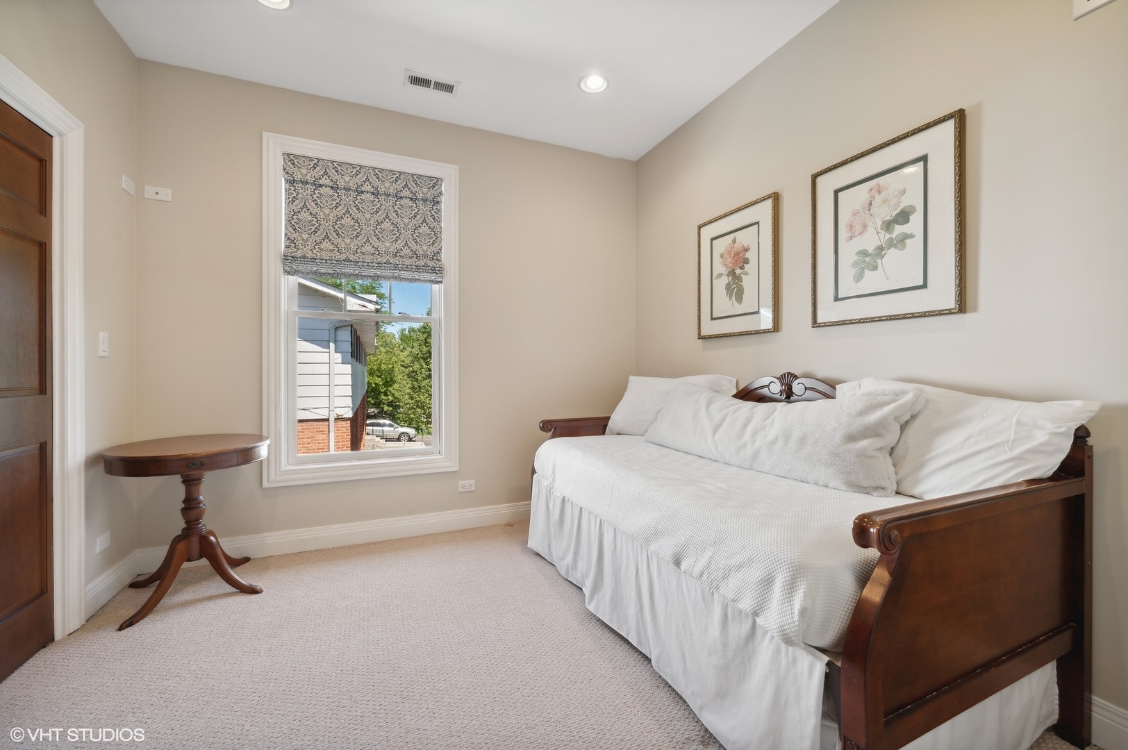 948 Green Bay Road Glencoe, IL 60022 - Photo 13 of 21 a bedroom with a bed and a window