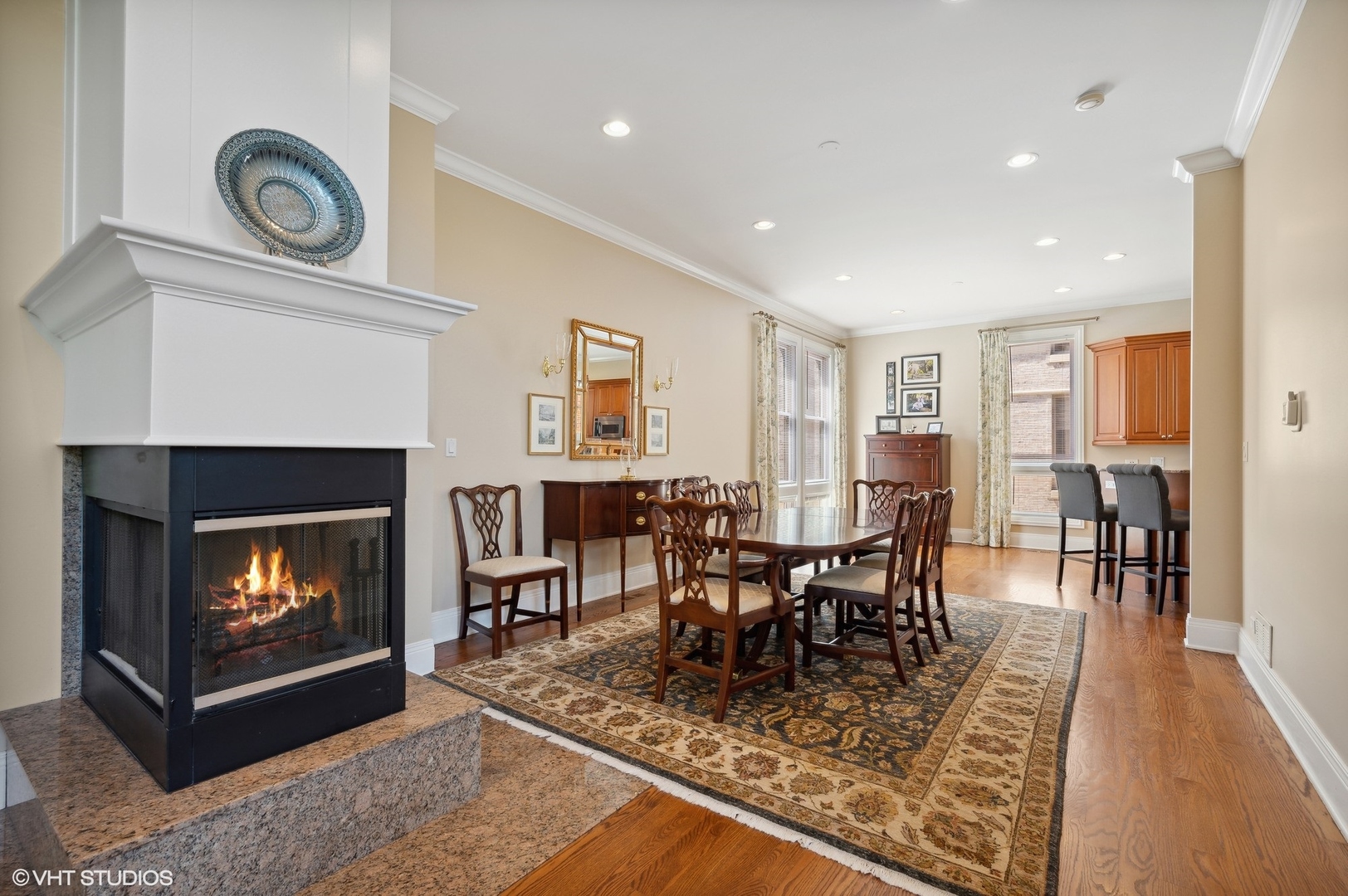948 Green Bay Road Glencoe, IL 60022 - Photo 4 of 21 a dining room with furniture and a fireplace