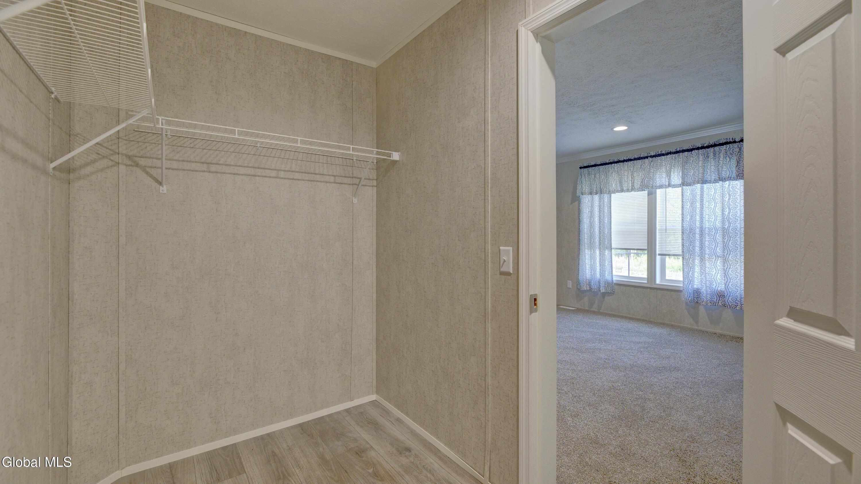 258 Burtonville Road Charleston, NY 12072 - Photo 29 of 47 Walk in Closet in Primary Bedroom