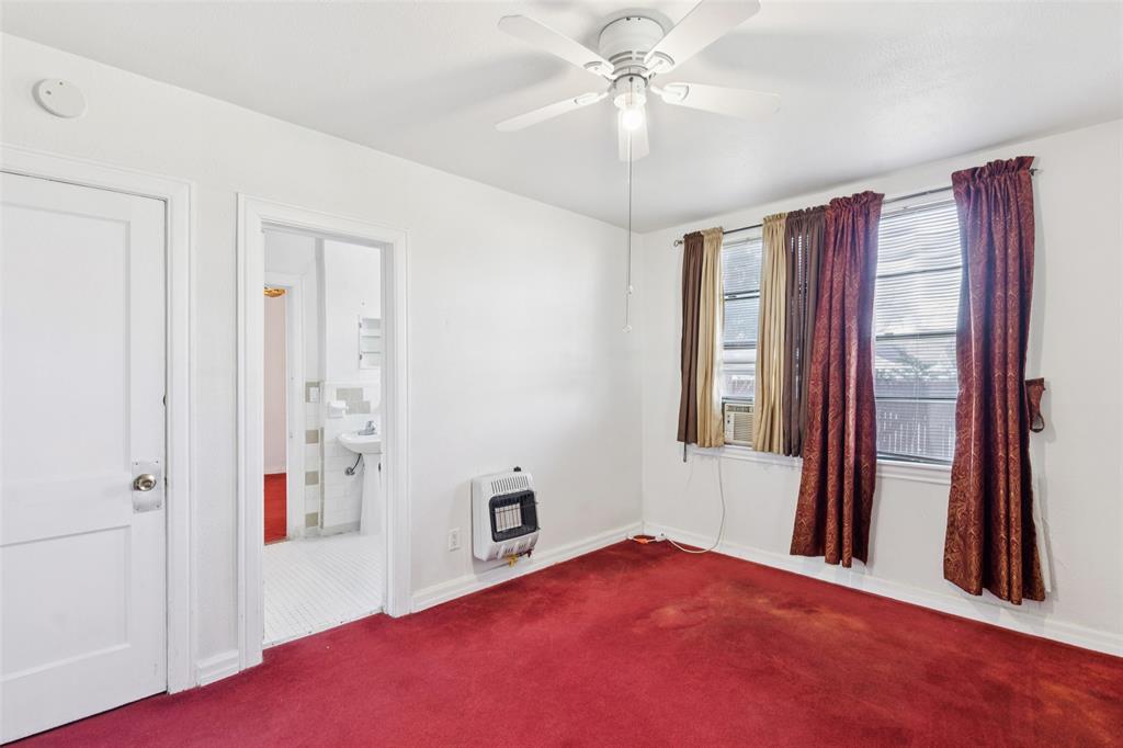 1602 Bruce Drive Garland, TX 75043 - Photo 23 of 31 wooden floor in an empty room with a window