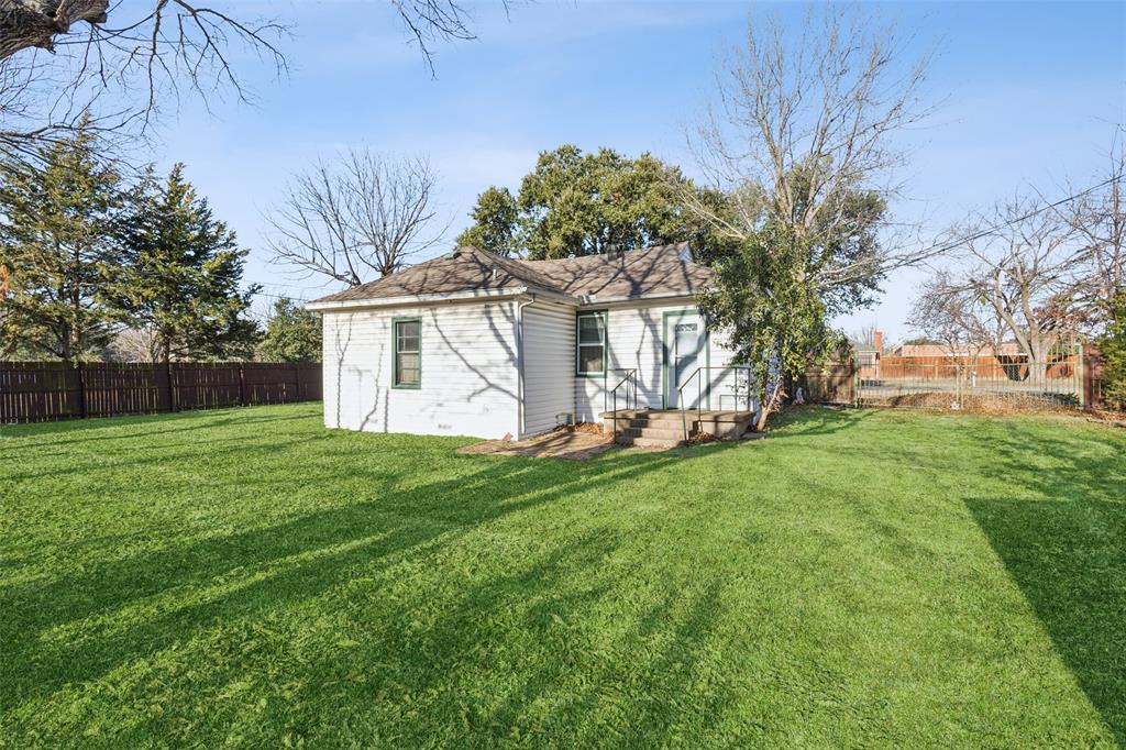 1602 Bruce Drive Garland, TX 75043 - Photo 28 of 31 a front view of house with yard and green space