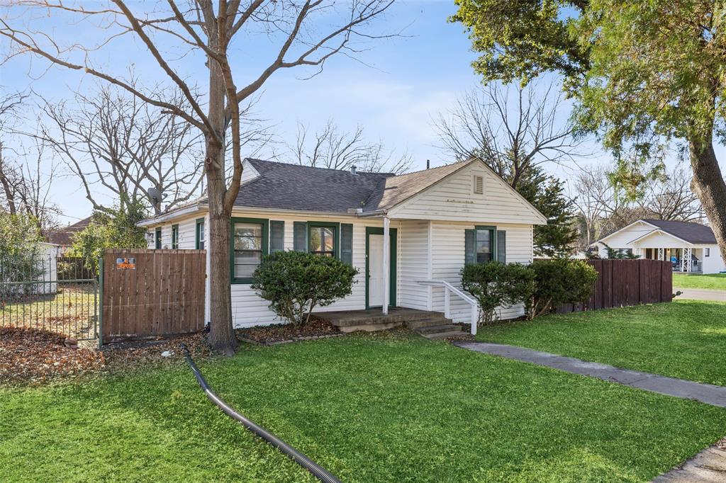 1602 Bruce Drive Garland, TX 75043 - Photo 3 of 31 a front view of a house with garden