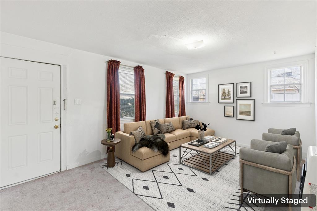 1602 Bruce Drive Garland, TX 75043 - Photo 9 of 31 a living room with furniture and a window