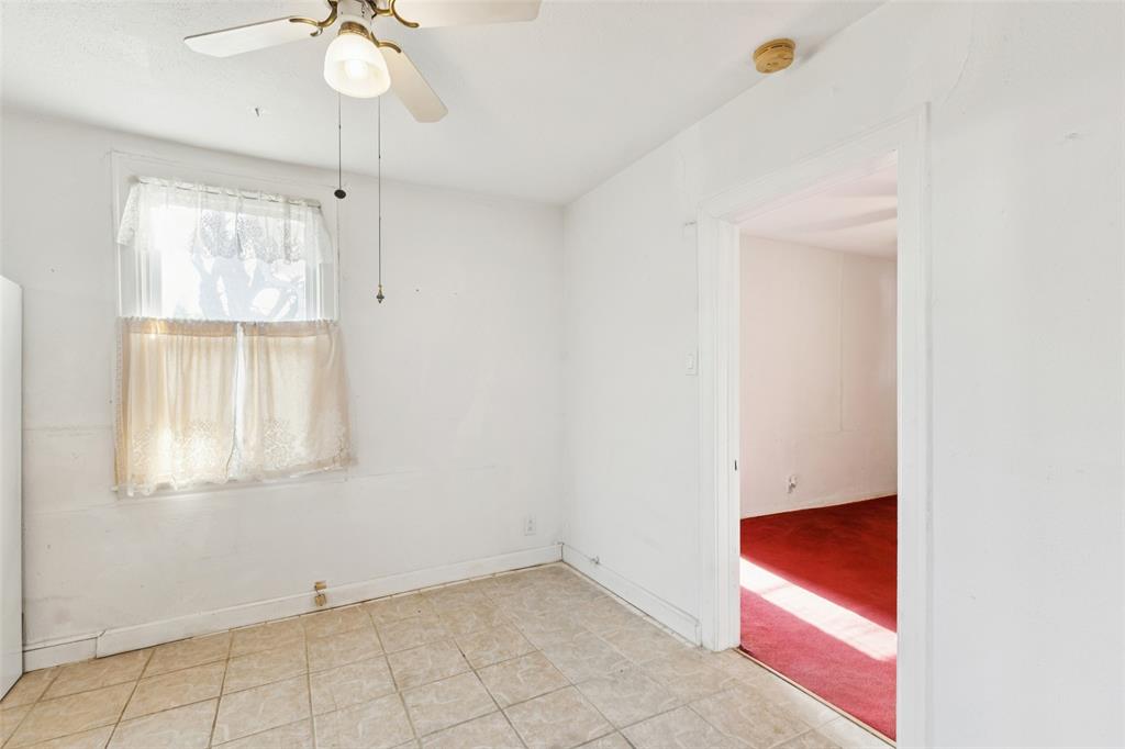 1602 Bruce Drive Garland, TX 75043 - Photo 10 of 31 an empty room with a window