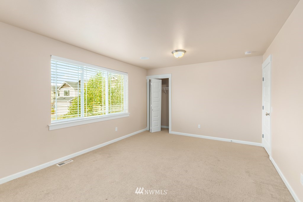 22511 38th Avenue Southeast Bothell, WA 98021 - Photo 22 of 29 a view of an empty room with a window
