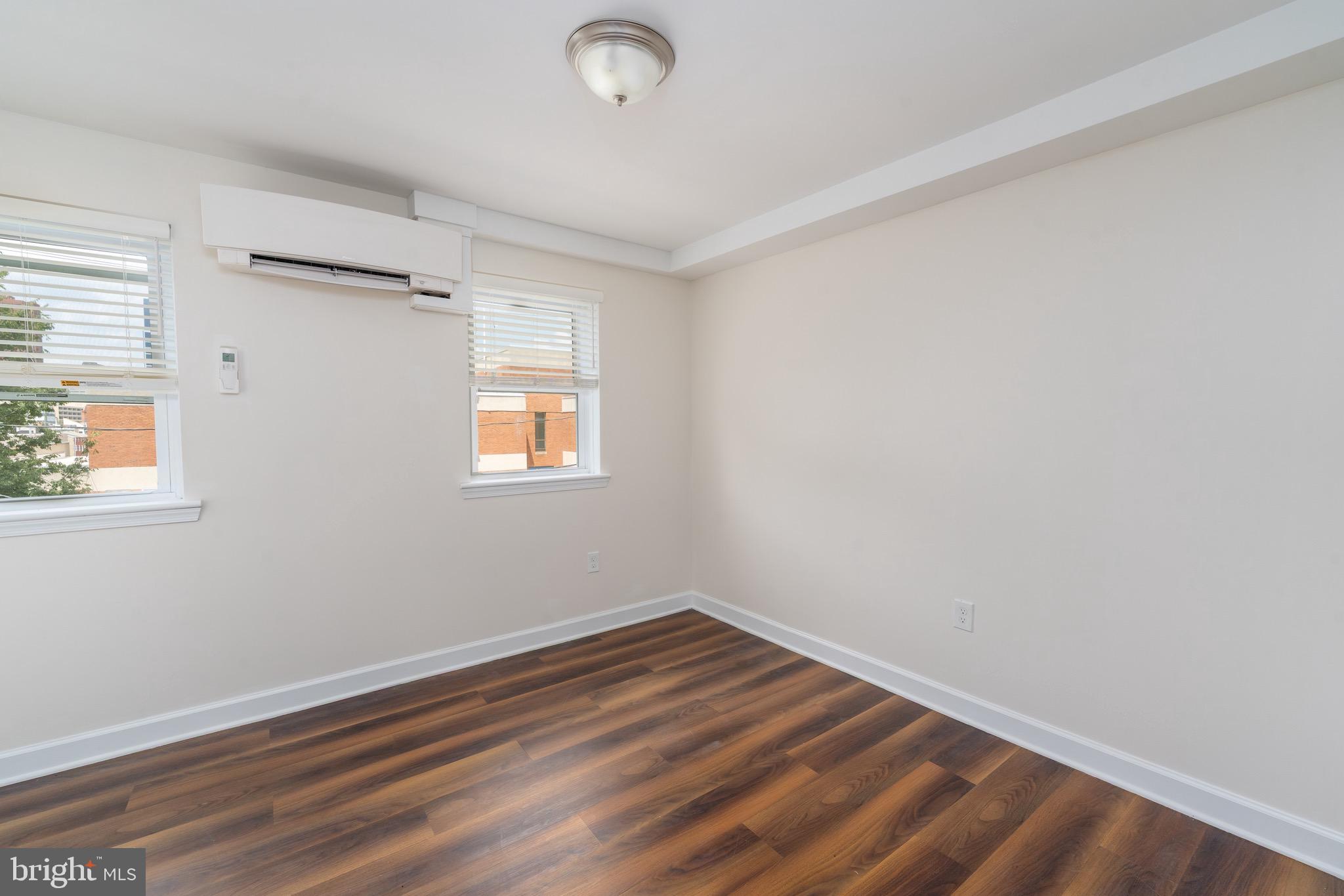 123 East Cross Street Baltimore, MD 21230 - Photo 26 of 33 wooden floor in an empty room