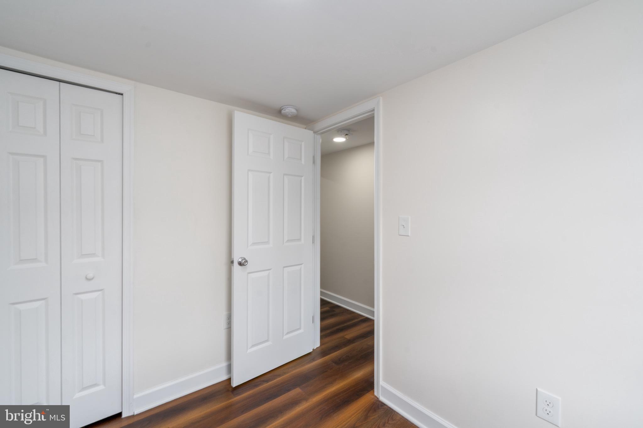 123 East Cross Street Baltimore, MD 21230 - Photo 29 of 33 a view of a hallway with wooden floor