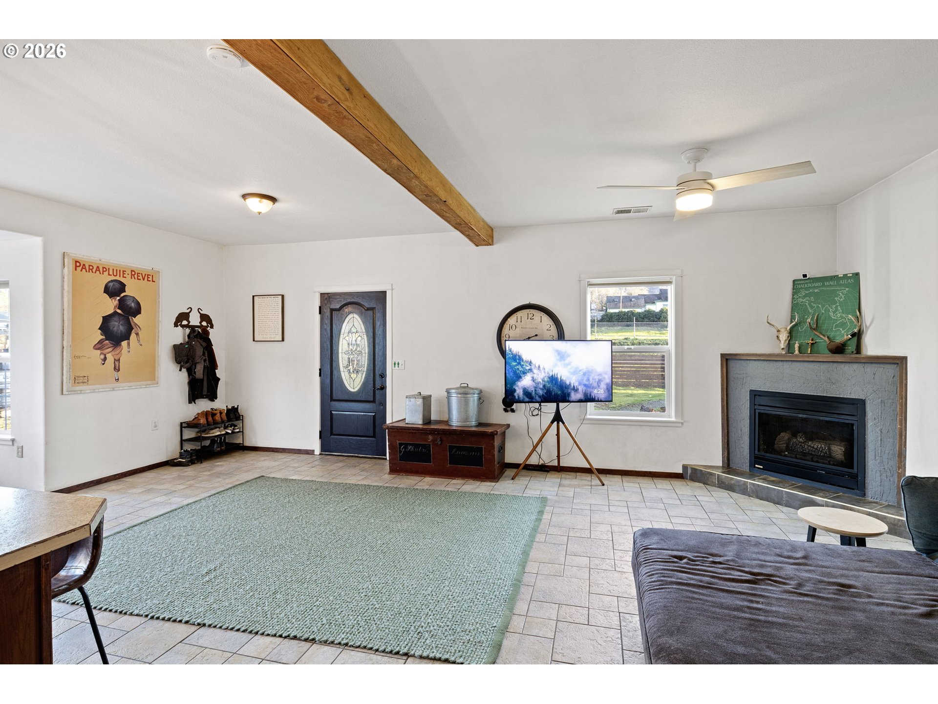 777 Oak Street Oakland, OR 97462 - Photo 13 of 45 a living room with furniture and a fireplace