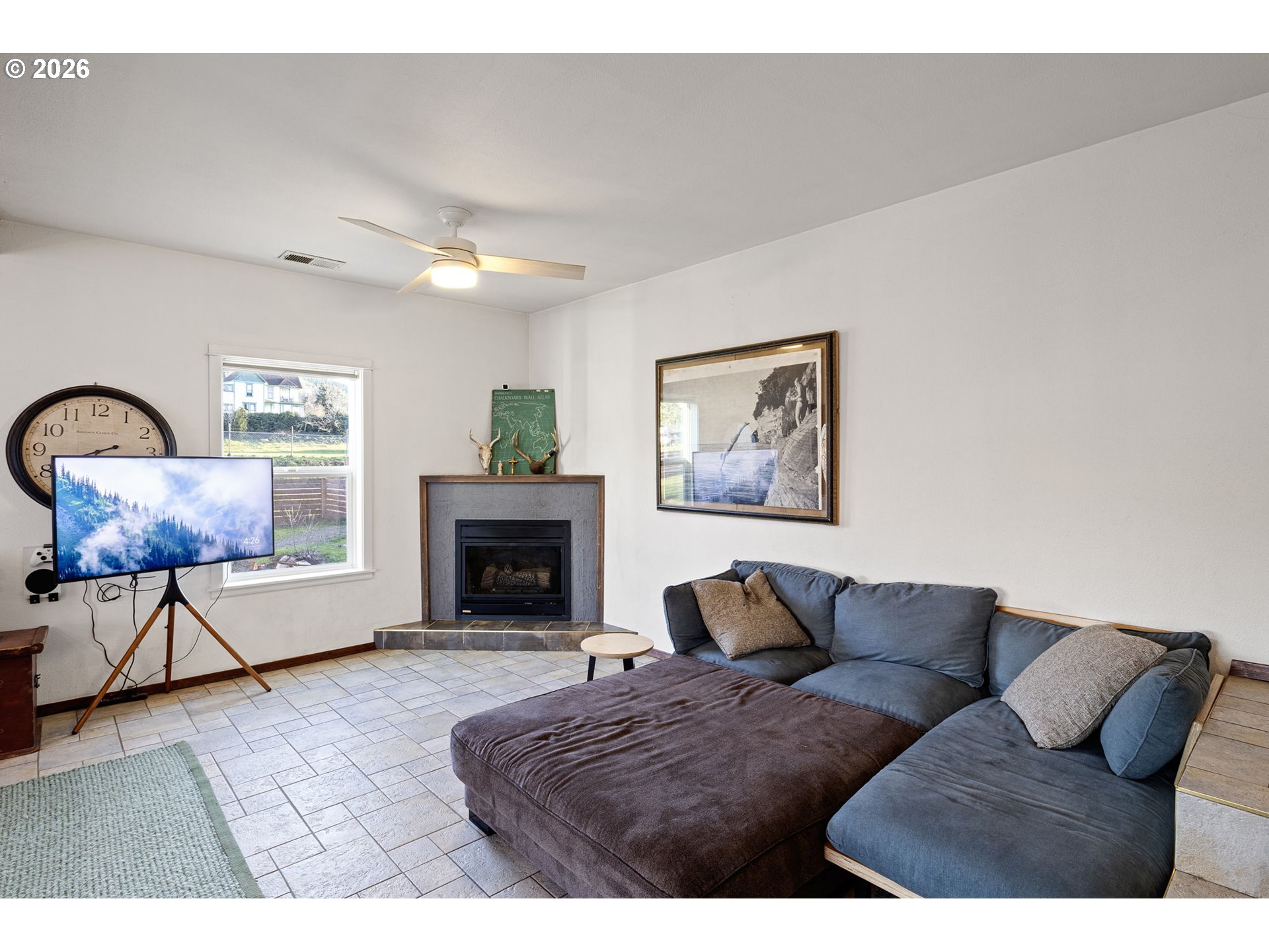 777 Oak Street Oakland, OR 97462 - Photo 14 of 45 a living room with furniture and a fireplace