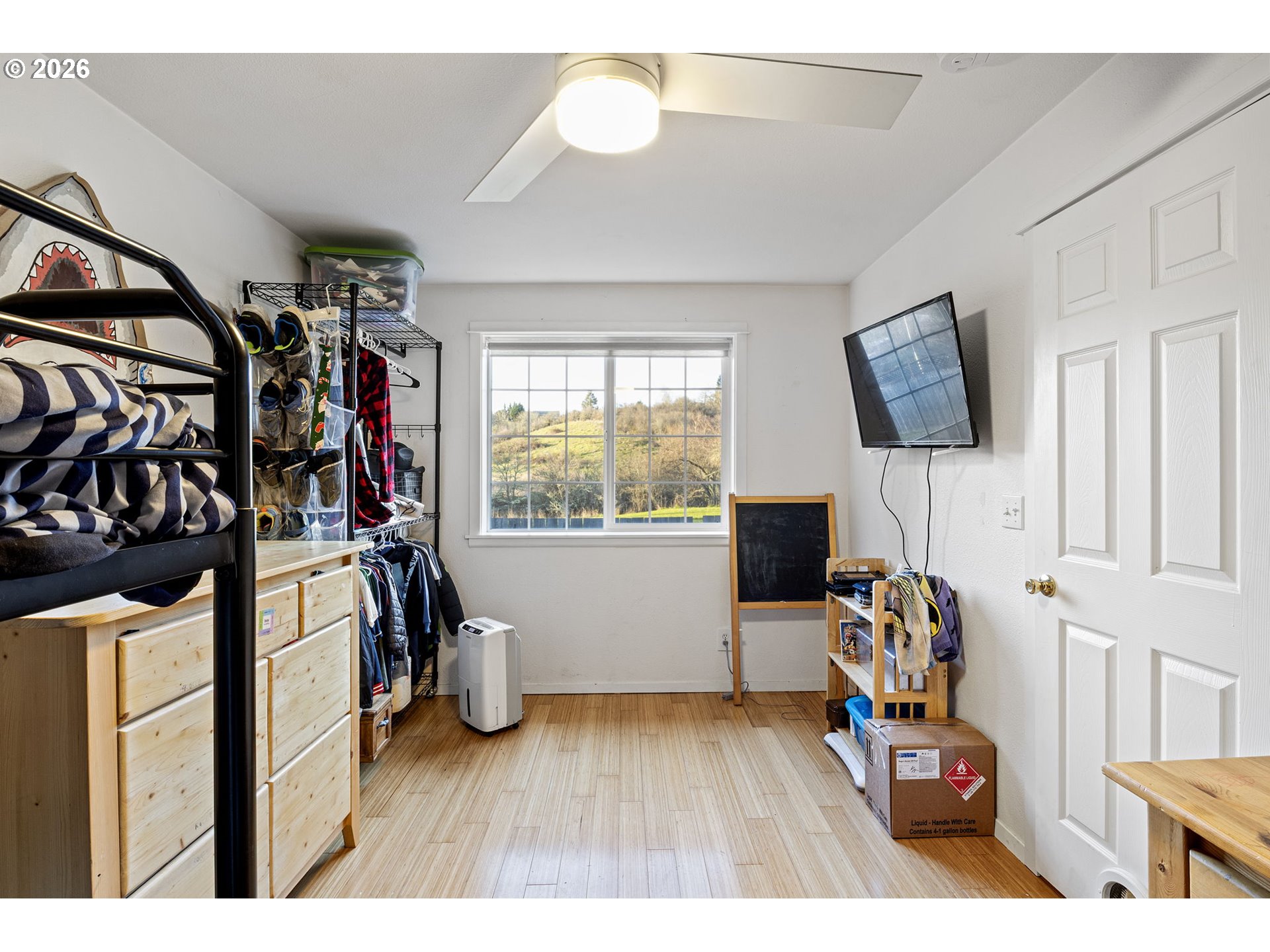 777 Oak Street Oakland, OR 97462 - Photo 22 of 45 a bedroom with furniture and a window