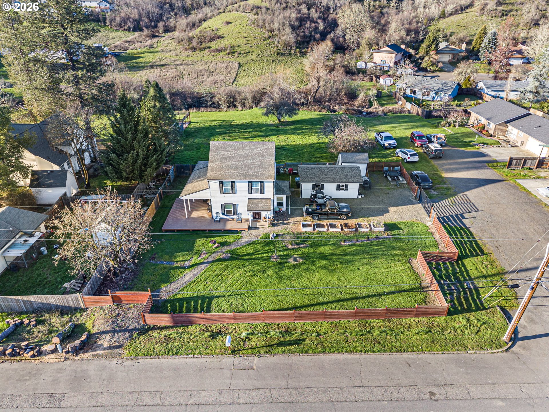 777 Oak Street Oakland, OR 97462 - Photo 4 of 45 an aerial view of a house with a yard and lake view