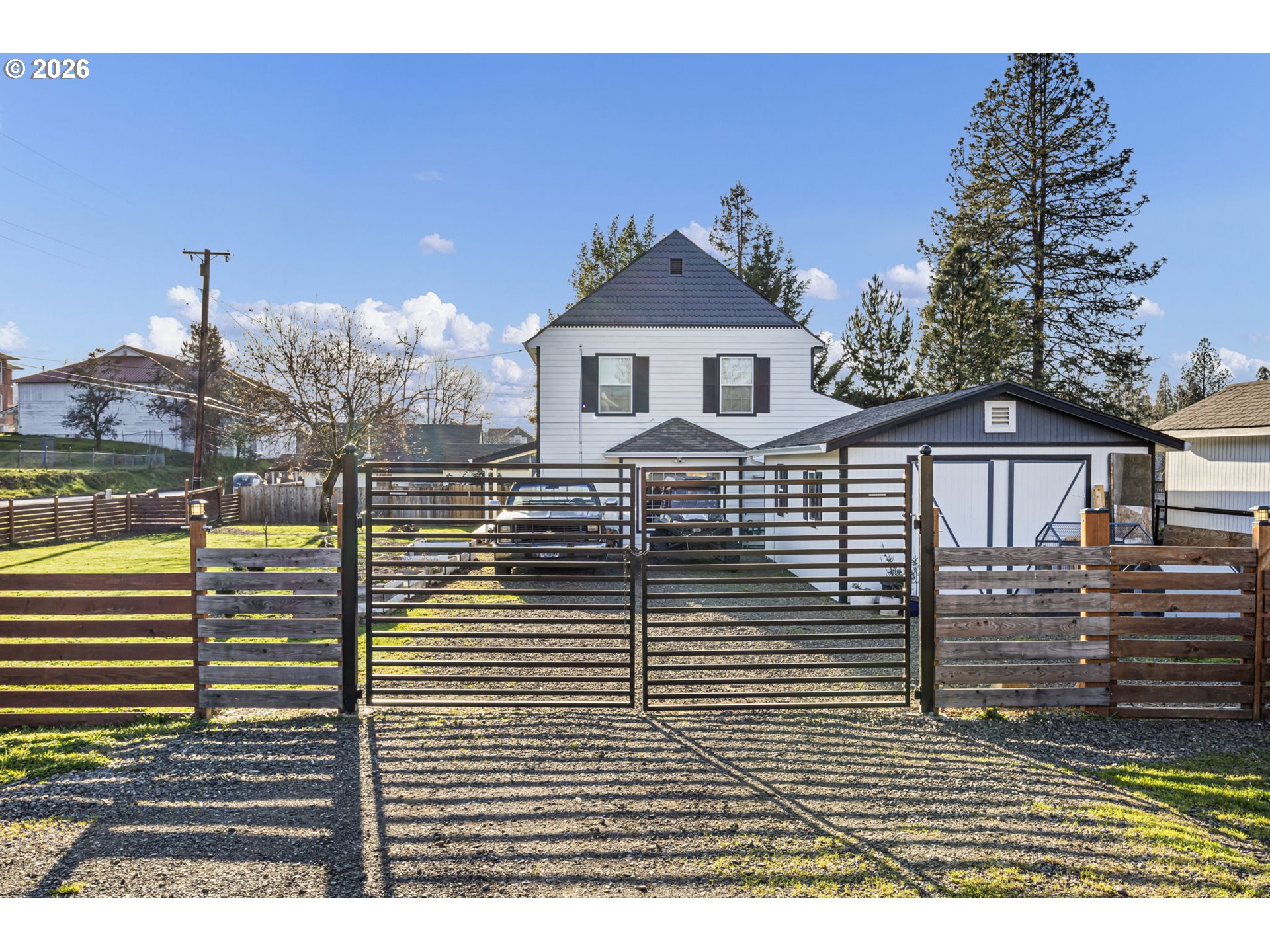 777 Oak Street Oakland, OR 97462 - Photo 41 of 45 a view of a house with a wooden deck
