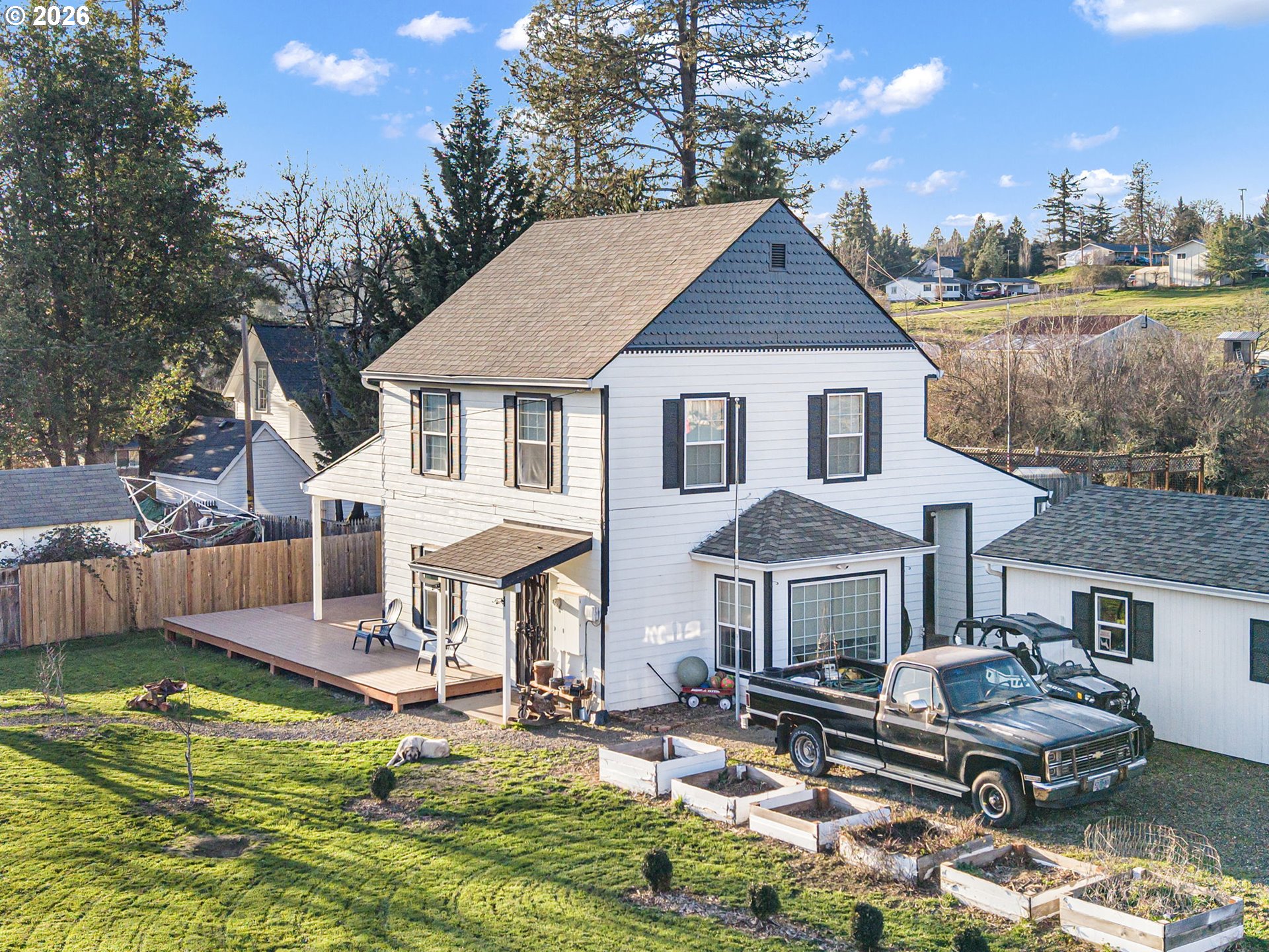 777 Oak Street Oakland, OR 97462 - Photo 42 of 45 a front view of a house with swimming pool having outdoor seating