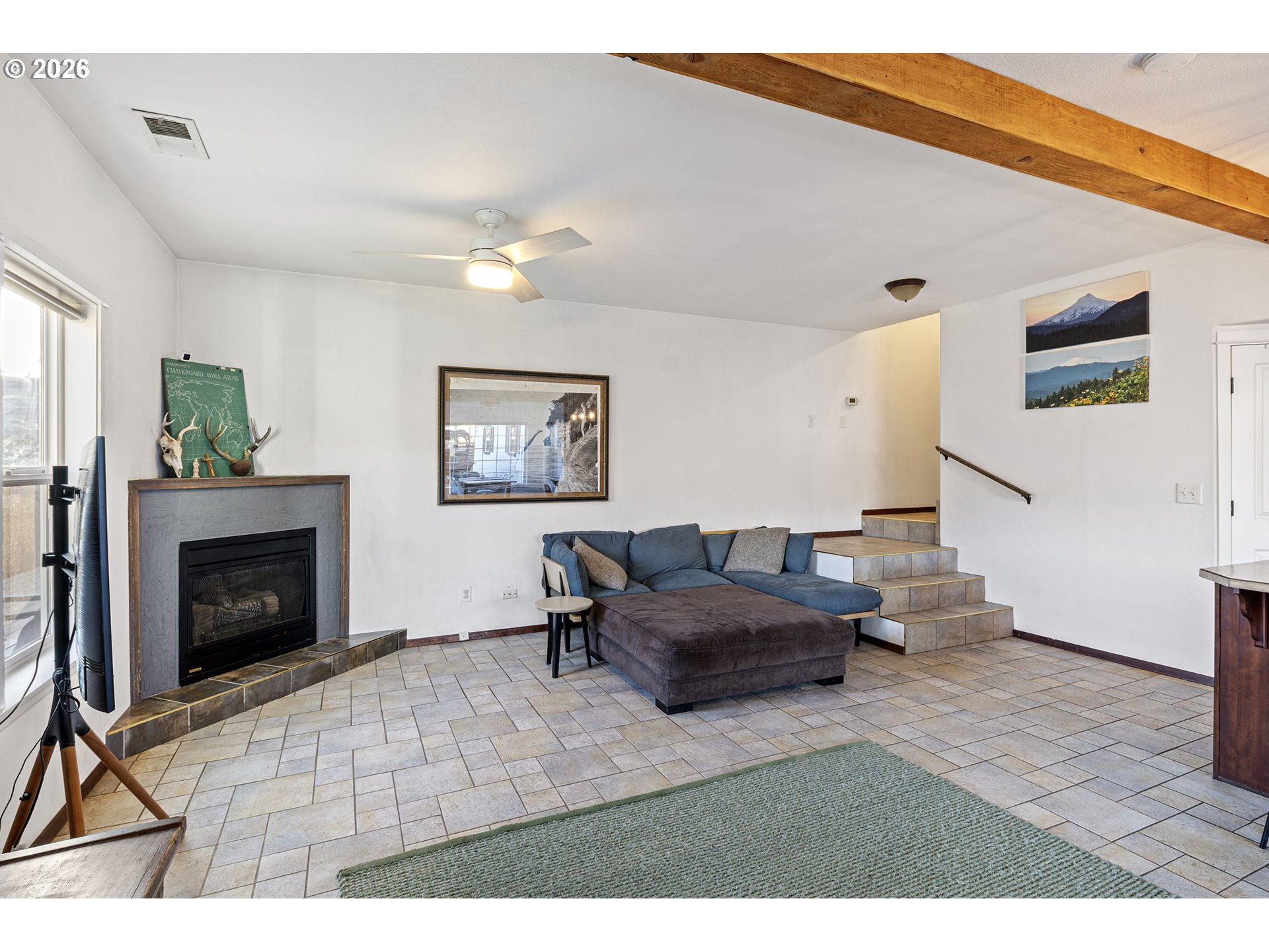 777 Oak Street Oakland, OR 97462 - Photo 8 of 45 a living room with furniture and a fireplace