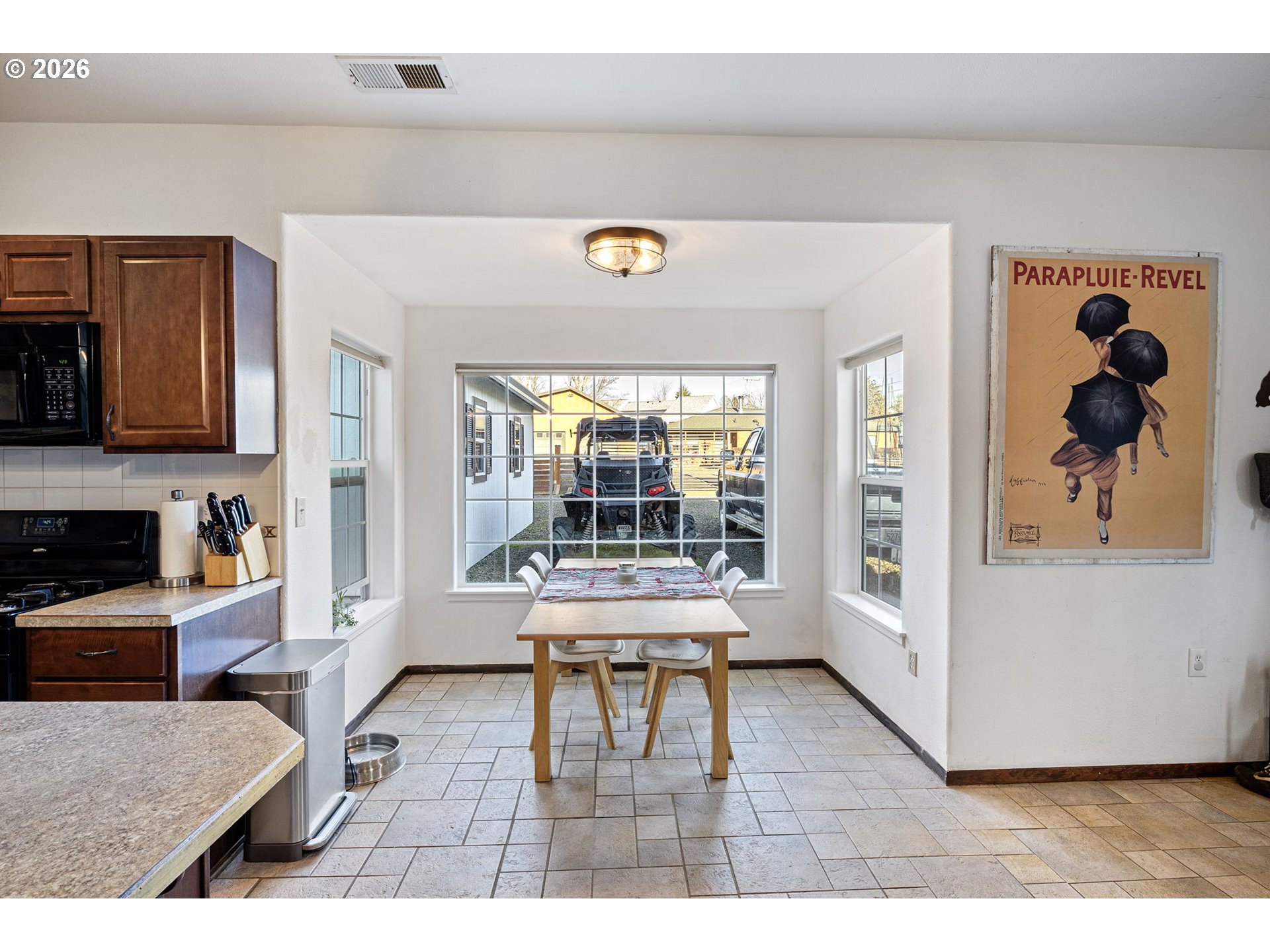 777 Oak Street Oakland, OR 97462 - Photo 10 of 45 a living room with furniture and a large window