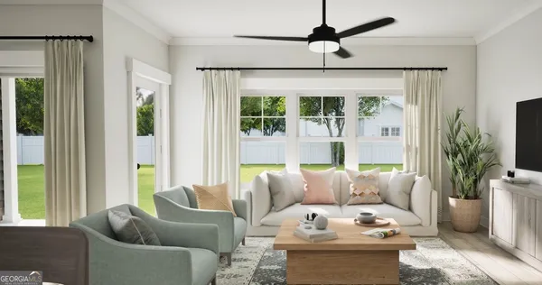 a living room with furniture and a large window
