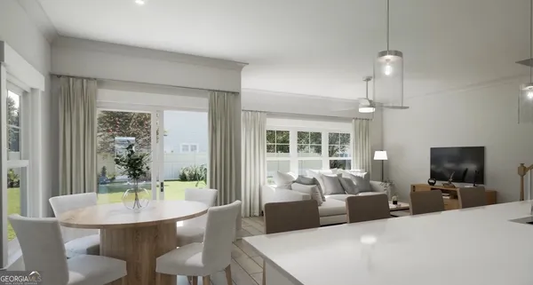a living room with furniture a chandelier and a flat screen tv