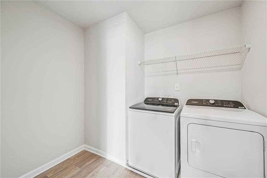 1428 High Fls Lane Grayson, GA 30017 - Photo 28 of 39 a utility room with dryer and washer
