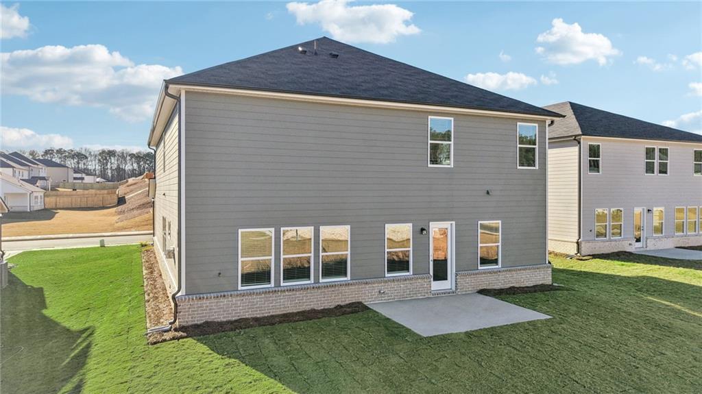 1428 High Fls Lane Grayson, GA 30017 - Photo 36 of 39 a view of backyard of house with entertaining space