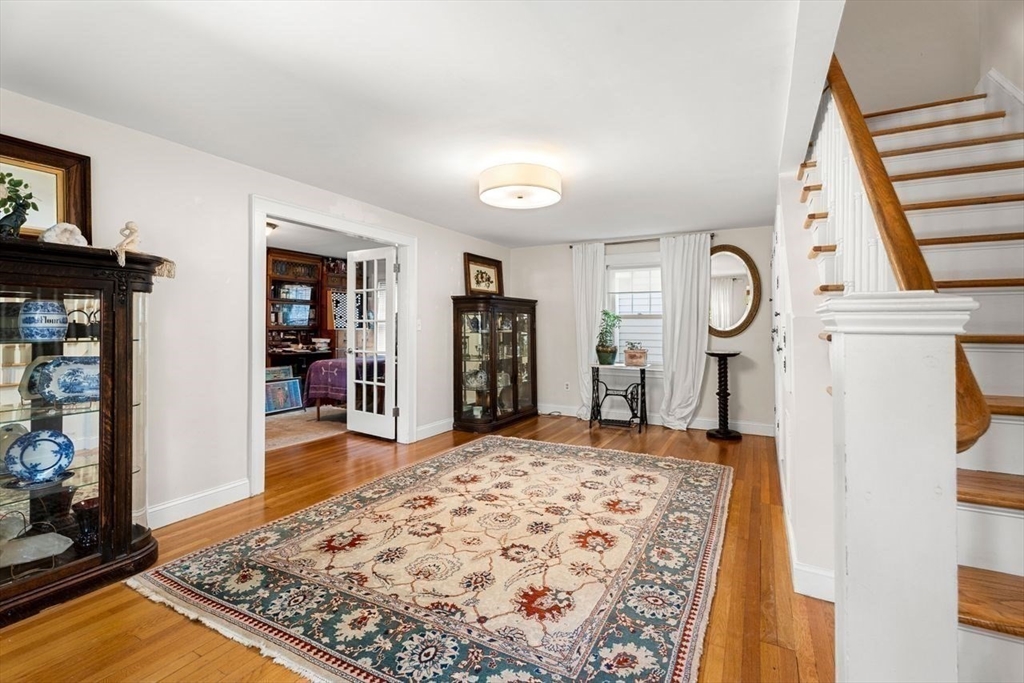 139 Jersey Street Marblehead, MA 01945 - Photo 11 of 42 a large bedroom with bed and wooden floor