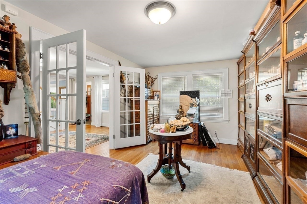139 Jersey Street Marblehead, MA 01945 - Photo 15 of 42 a bedroom with furniture and a wooden floor
