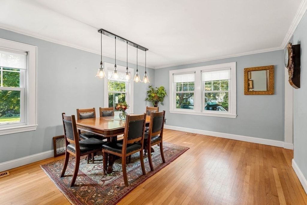 139 Jersey Street Marblehead, MA 01945 - Photo 17 of 42 a view of a dining room with furniture window and wooden floor