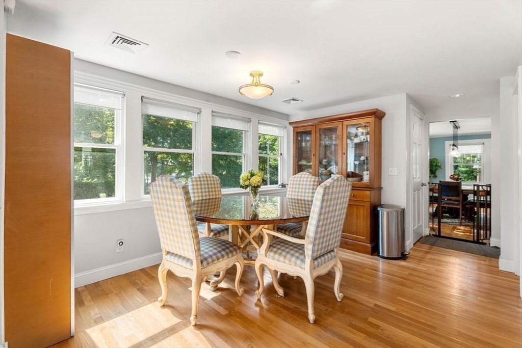 139 Jersey Street Marblehead, MA 01945 - Photo 18 of 42 a view of a dining room with furniture and wooden floor