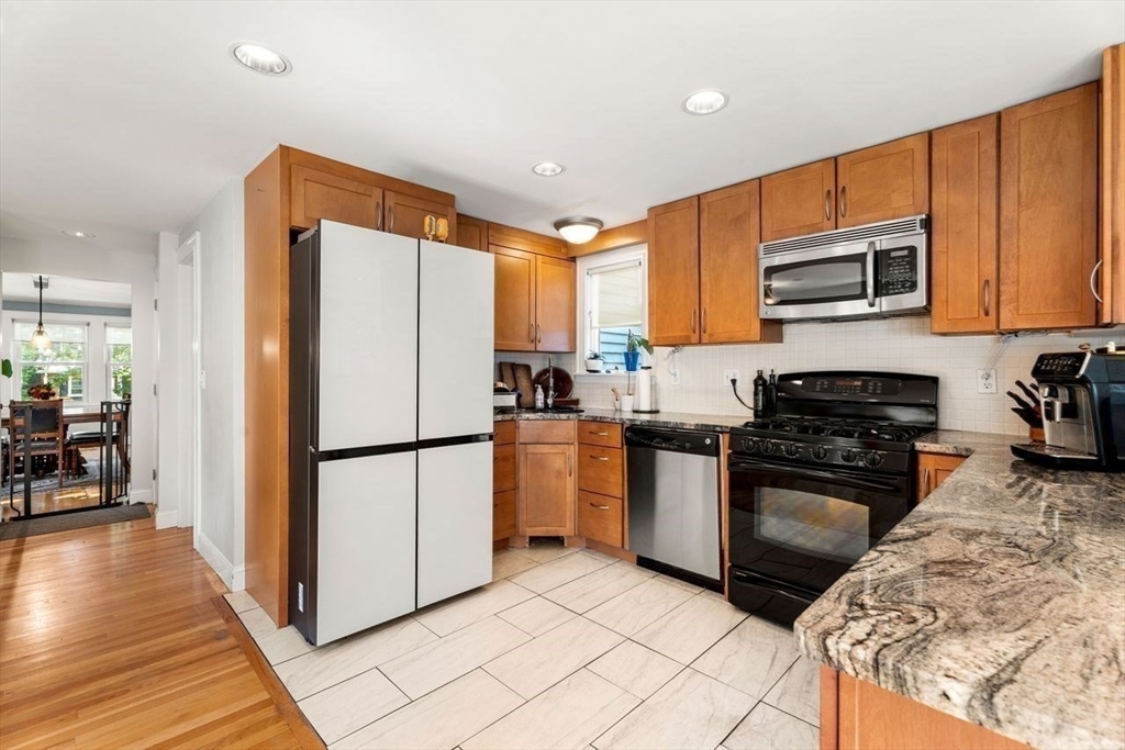 139 Jersey Street Marblehead, MA 01945 - Photo 20 of 42 a kitchen with a refrigerator sink and microwave