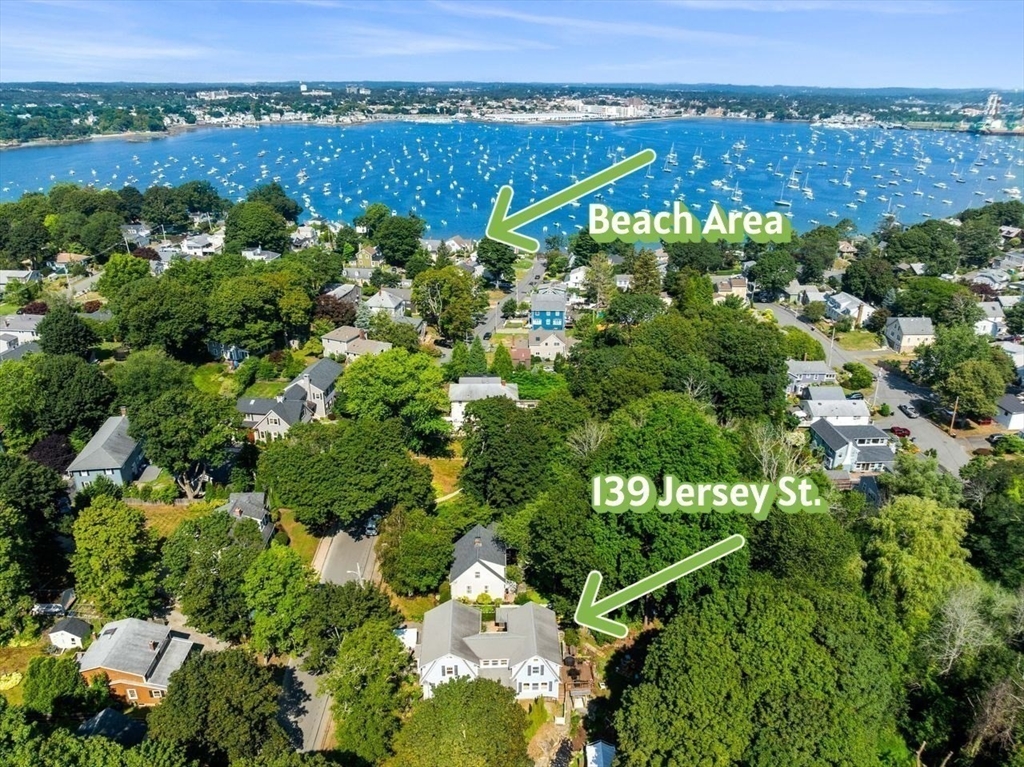 139 Jersey Street Marblehead, MA 01945 - Photo 2 of 42 an aerial view of a houses with a yard and lake