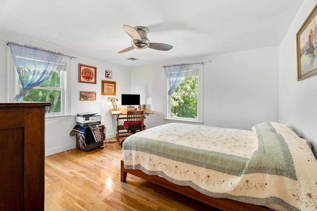 139 Jersey Street Marblehead, MA 01945 - Photo 33 of 42 a bedroom with a bed and furniture