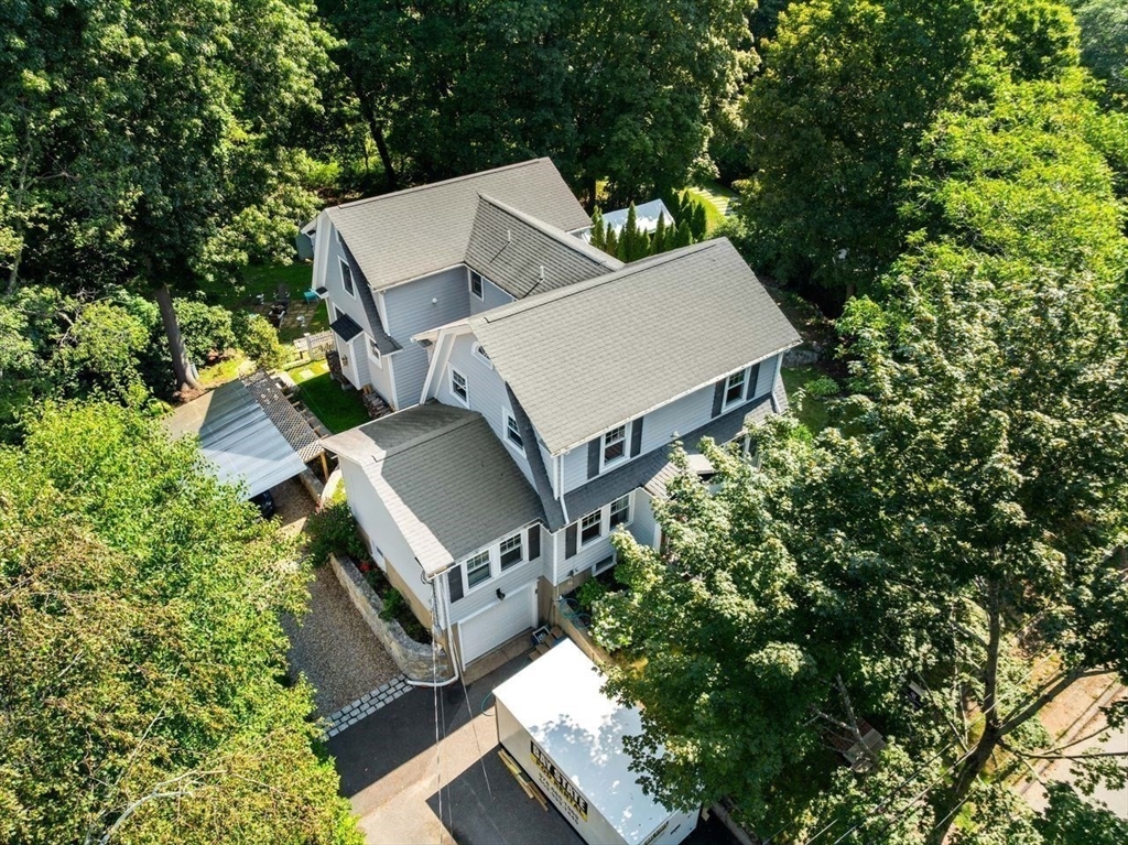 139 Jersey Street Marblehead, MA 01945 - Photo 9 of 42 an aerial view of a house with a garden