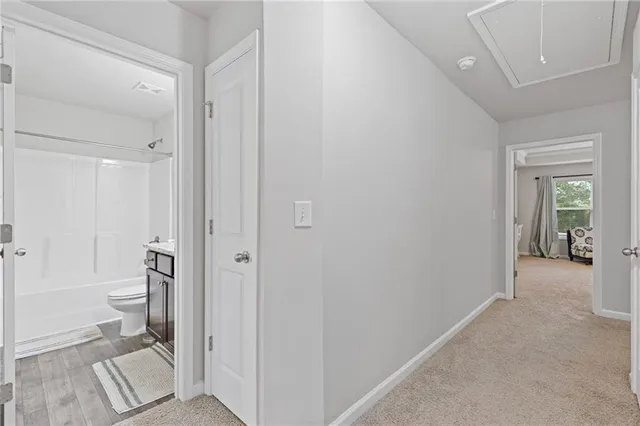 a view of an empty room and window