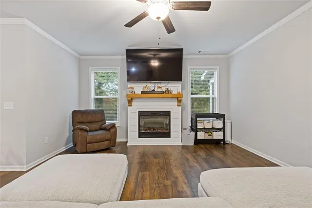 a view of a backyard with open kitchen