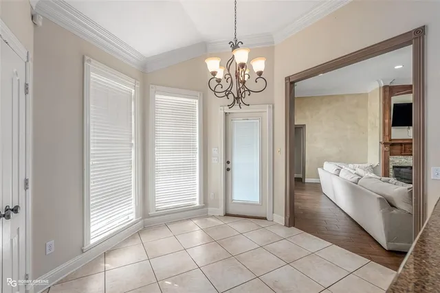a bathroom with a toilet mirror and vanity