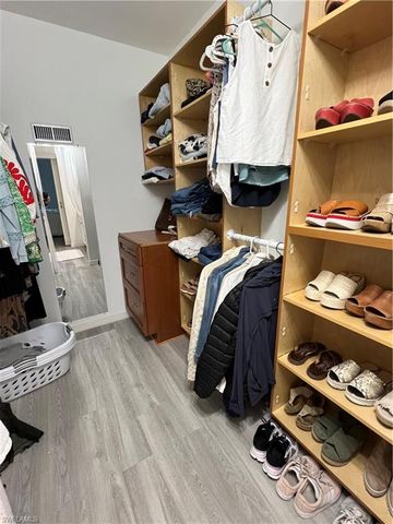 a room with furniture and a wooden floor