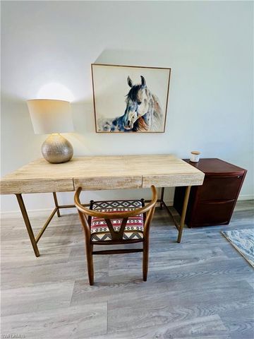 a living room with furniture and rug