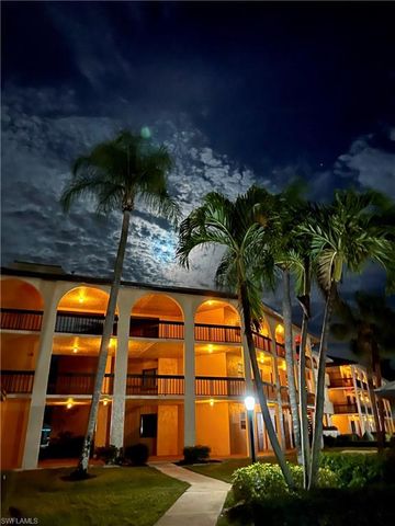 a view of building with yard