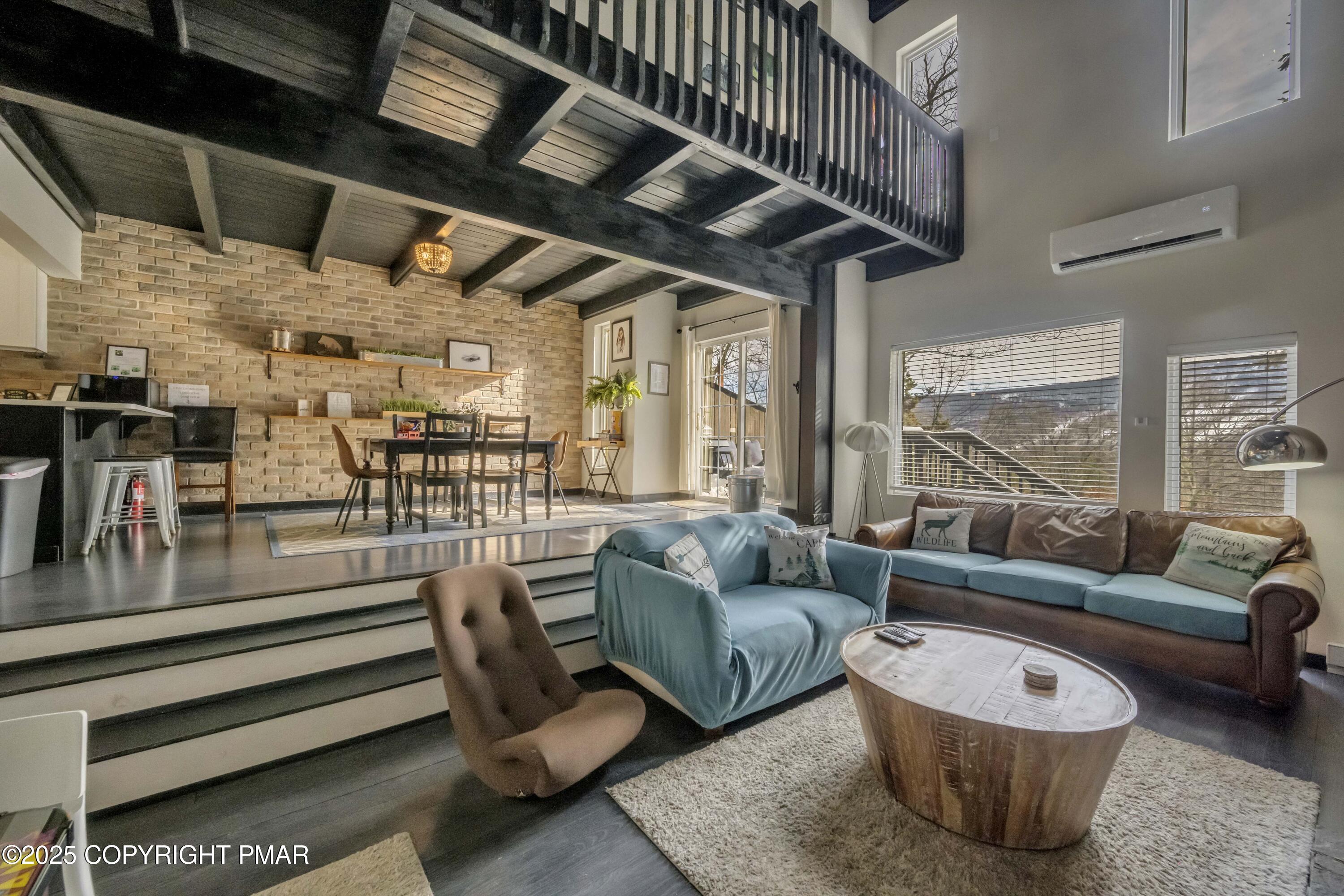 1126 Incline Village East Tannersville, PA 18372 - Photo 11 of 37 a living room with furniture and a large window
