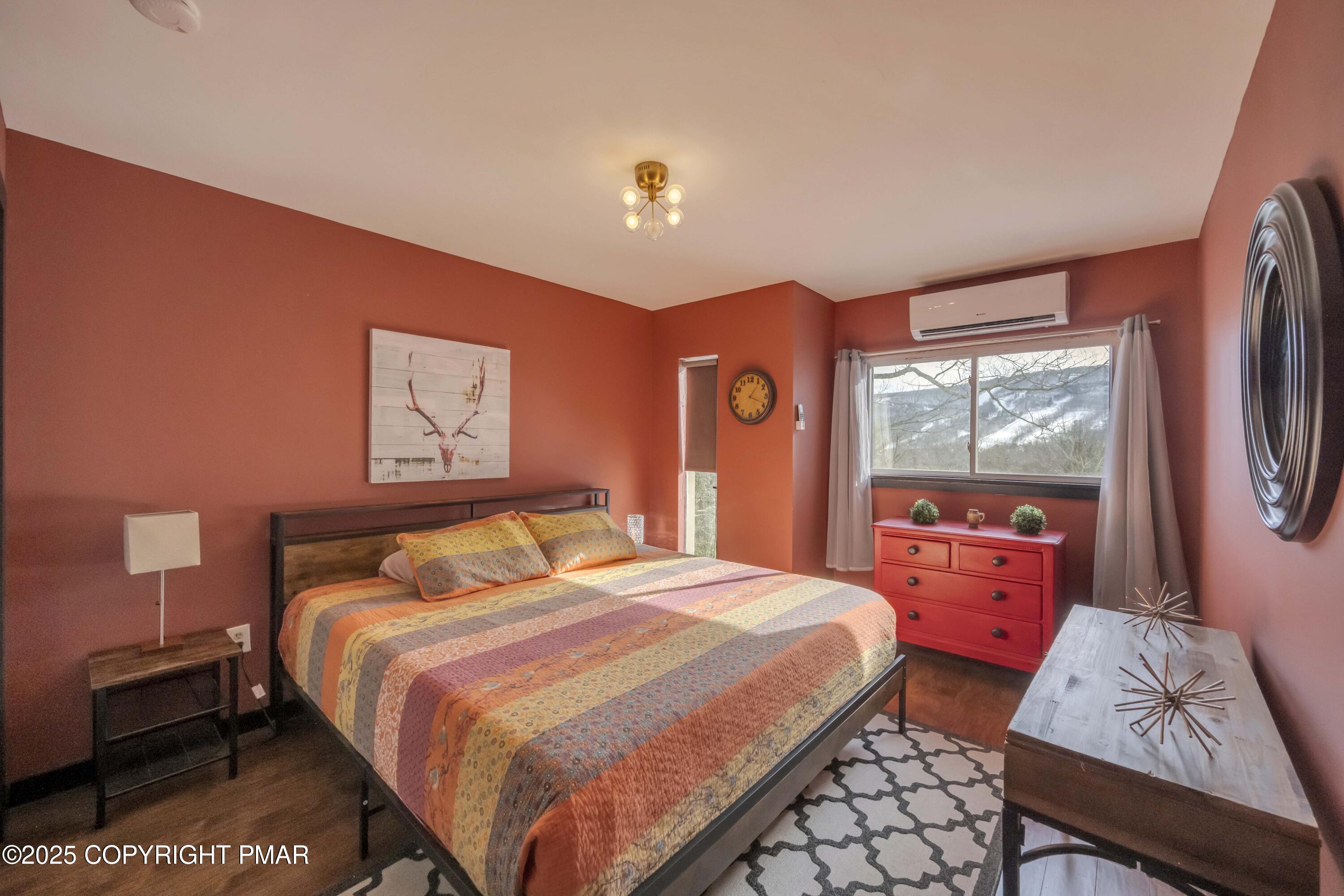 1126 Incline Village East Tannersville, PA 18372 - Photo 16 of 37 a bedroom with a bed and wooden floor