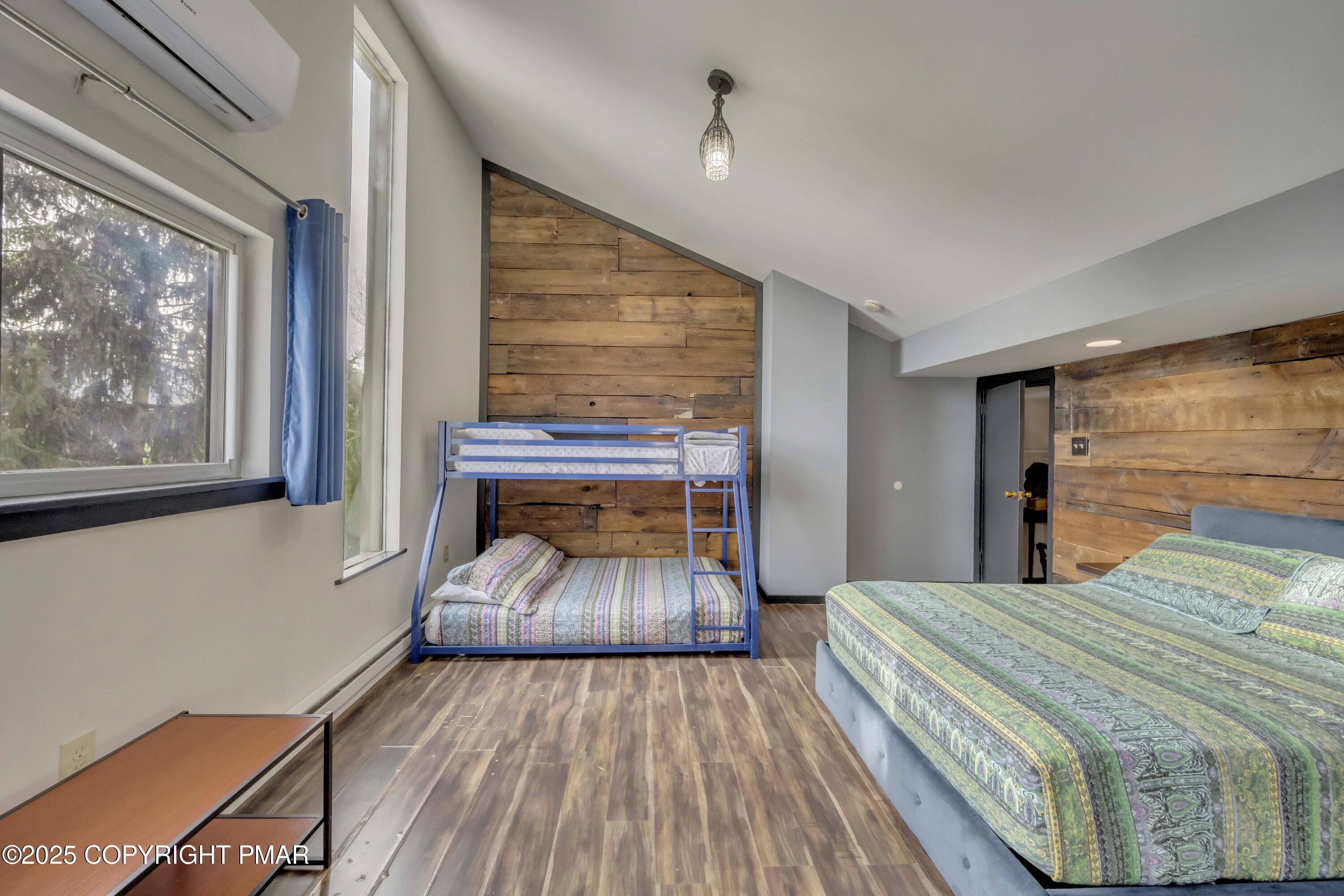 1126 Incline Village East Tannersville, PA 18372 - Photo 20 of 37 a bedroom with a bed and wooden floor