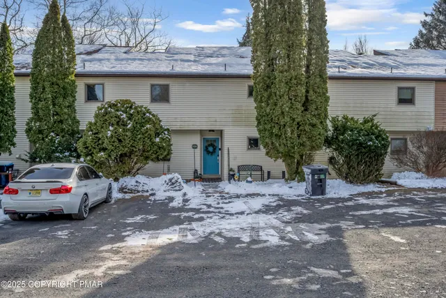 a view of street with parked cars