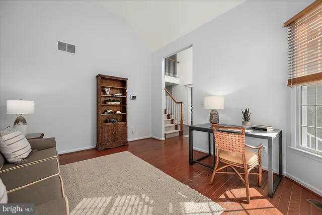 a bedroom with a bed and cabinets