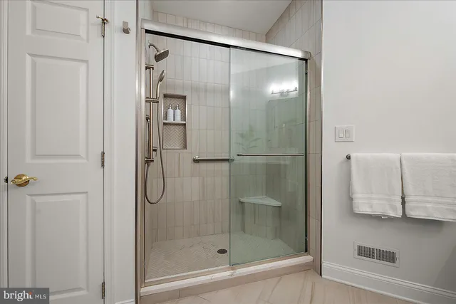 a view of a hallway with windows