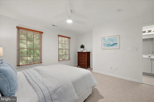 a bathroom with a double vanity sink and mirror