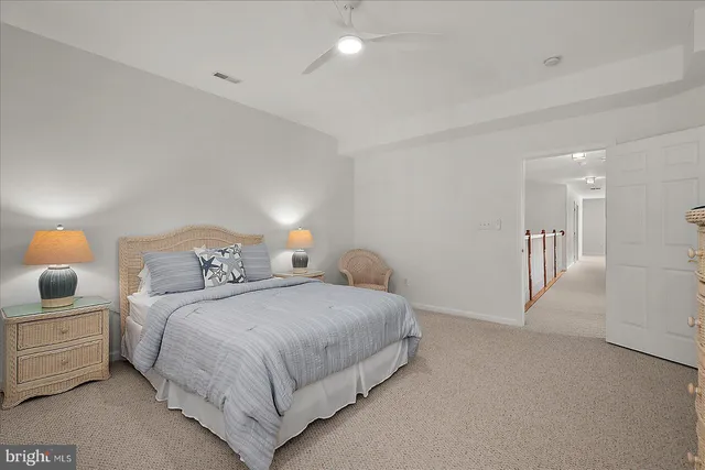 a bedroom with furniture and a couch