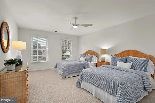 a view of a chairs and table in the balcony